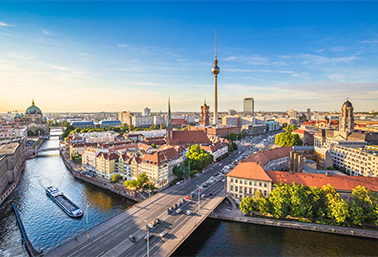 Berlin city skyline with River Spree, host city for ESMO AI & Digital Oncology Congress 2025 focused on artificial intelligence and digital cancer care.